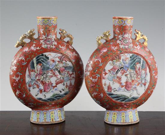 A pair of Chinese famille rose moon flasks, 19th century, 24.2cm, one neck repaired, slight losses to handles
